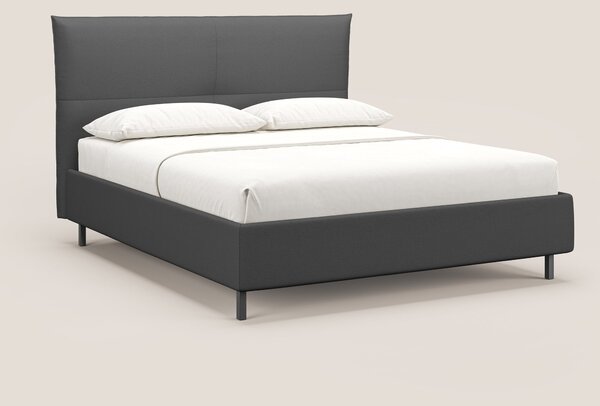 Izumi letto imbottito contenitore con piedi alti in tessuto smacchiabi