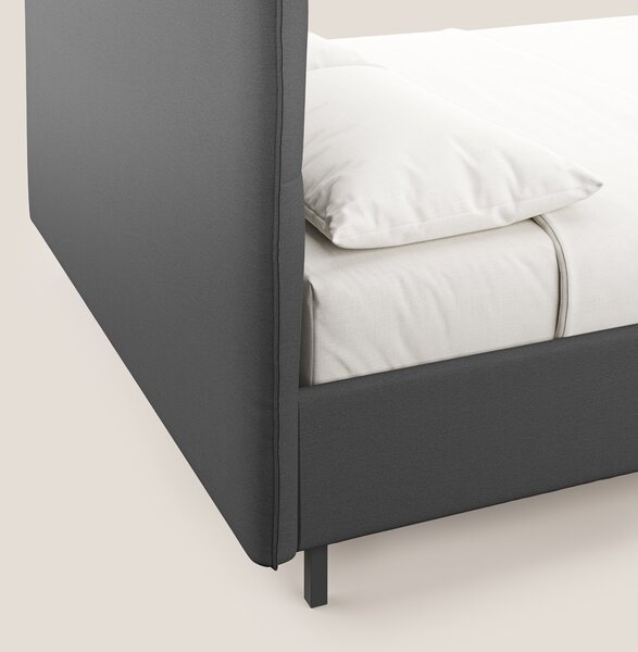 Izumi letto imbottito contenitore con piedi alti in tessuto smacchiabi
