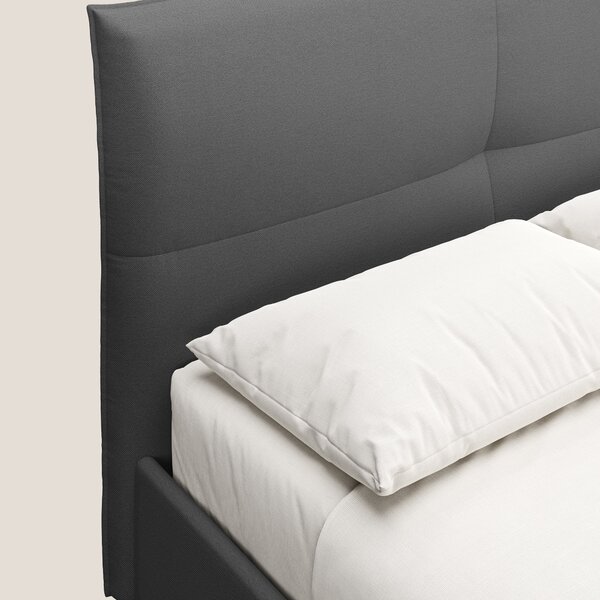Izumi letto imbottito contenitore con piedi alti in tessuto smacchiabi