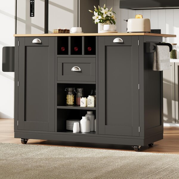 Isola da cucina nera su ruote, dimensioni 140x40x93,5 cm, realizzata in MDF e metallo con finitura effetto legno, dotata di piano di lavoro pieghevole, ideale per cucina e sala da pranzo