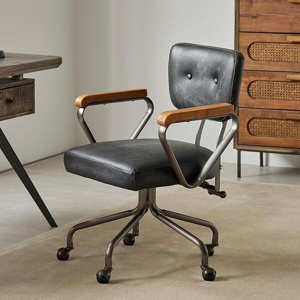 Sedia da ufficio in stile mid-century, realizzata in vera pelle, con funzione girevole e schienale regolabile, colore nero
