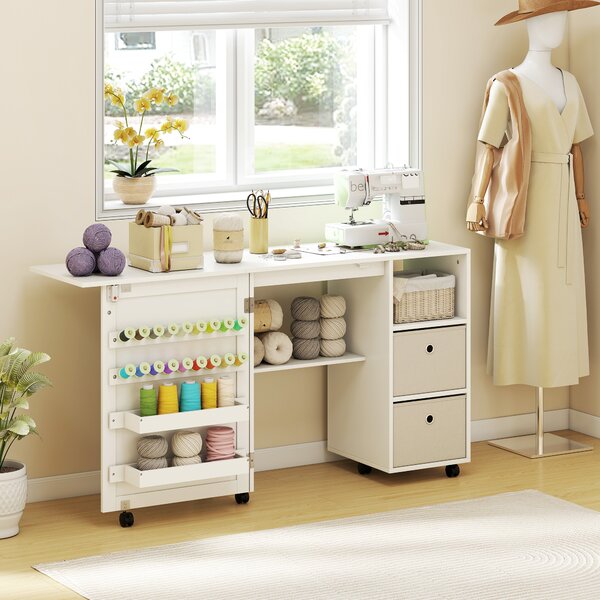 HOMCOM Tavolo da cucito pieghevole, mobile da cucito su ruote con porta magnetica, 2 vaschette, 2 cassetti, 146,4x40x77,5cm, bianco | Aosom Italy