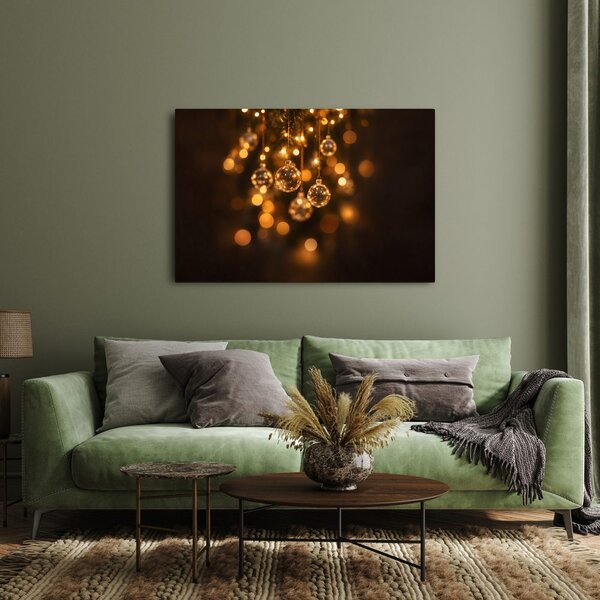 Quadro su tela – Palline di Natale dorate tra le luci