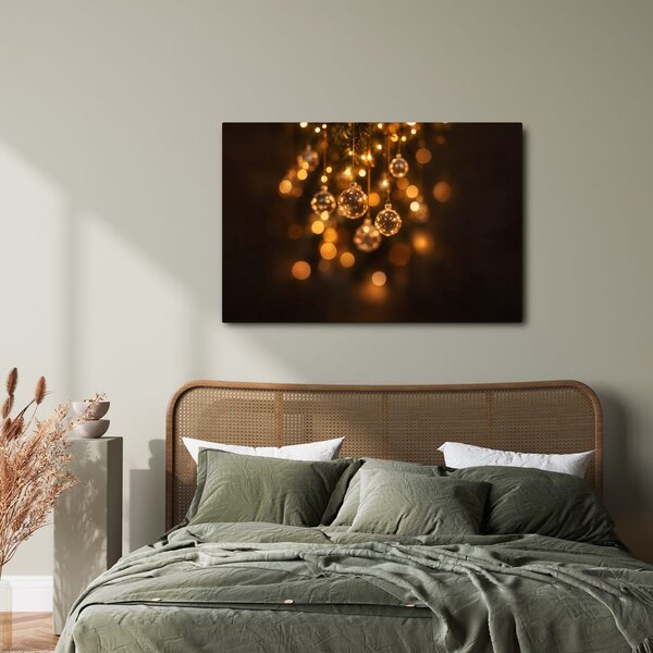 Quadro su tela – Palline di Natale dorate tra le luci