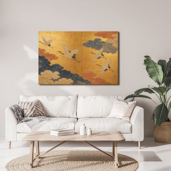 Quadro su tela – Gru tra nuvole dorate
