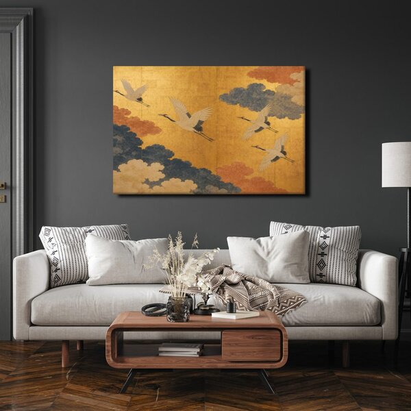Quadro su tela – Gru tra nuvole dorate