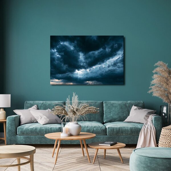 Quadro su tela – Nuvole temporalesche drammatiche sul paesaggio