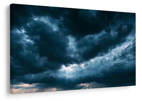 Quadro su tela – Nuvole temporalesche drammatiche sul paesaggio