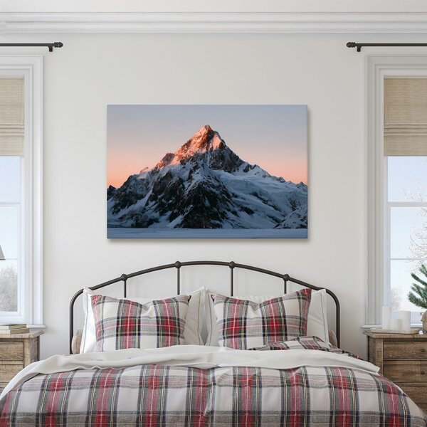 Quadro su tela – Vetta montana innevata al crepuscolo