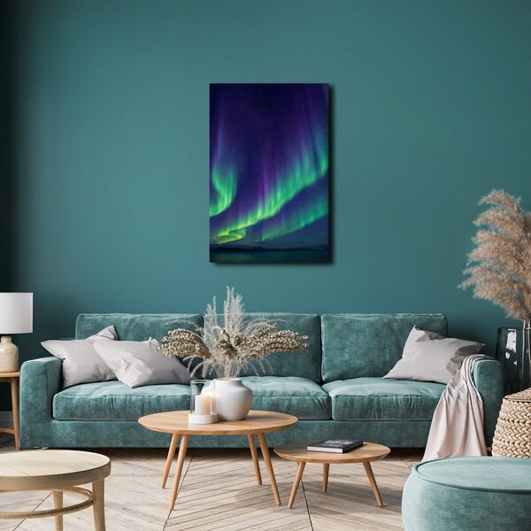 Quadro su tela – Bagliore verde e viola nel cielo notturno