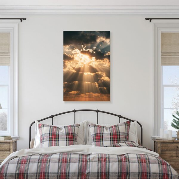 Quadro su tela – Luce celestiale tra le nuvole