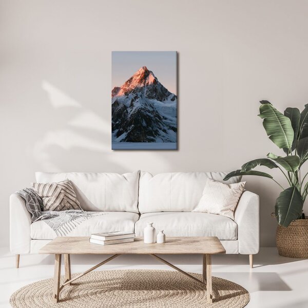 Quadro su tela – Maestosa montagna di ghiaccio nel bagliore rosa