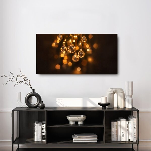 Quadro su tela – Sfere scintillanti nel bokeh caldo