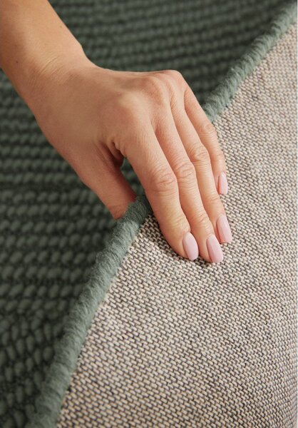Tappeto rotondo verde scuro in lana tessuto a mano ø 150 cm Calmio – Hanse Home