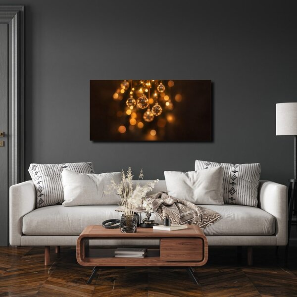 Quadro su tela – Sfere scintillanti nel bokeh caldo