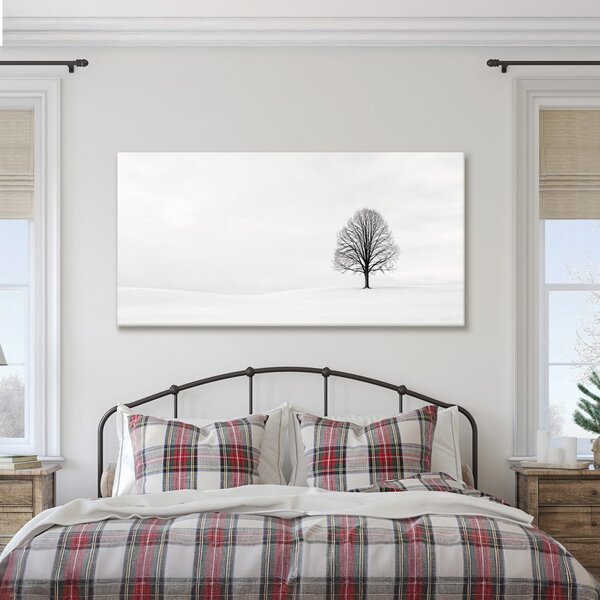 Quadro su tela – Albero della vita solitario nella neve