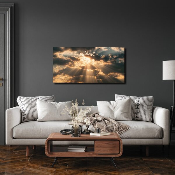 Quadro su tela – Sole drammatico dietro le nuvole