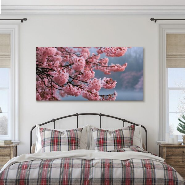 Quadro su tela – Sakura in fiore sull’acqua calma
