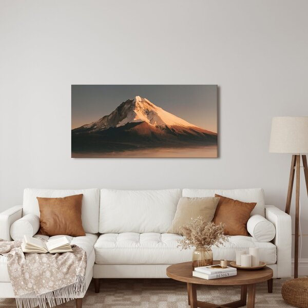 Quadro su tela – Montagna innevata nella luce dorata