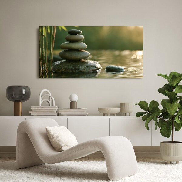 Quadro su tela – Equilibrio di pietre accanto al bambù