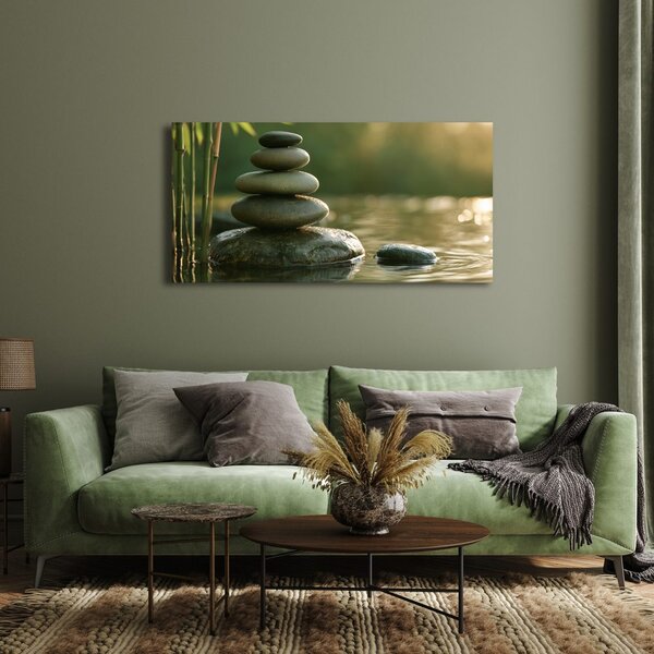 Quadro su tela – Equilibrio di pietre accanto al bambù