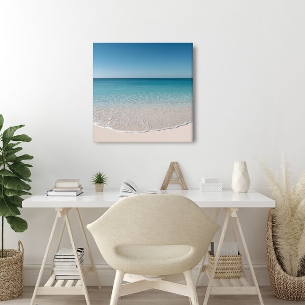 Quadro su tela – Orizzonte azzurro sulla spiaggia sabbiosa