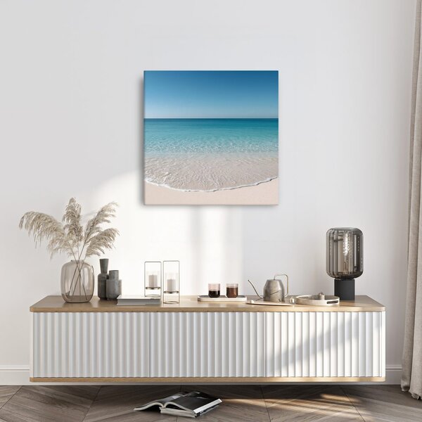 Quadro su tela – Orizzonte azzurro sulla spiaggia sabbiosa
