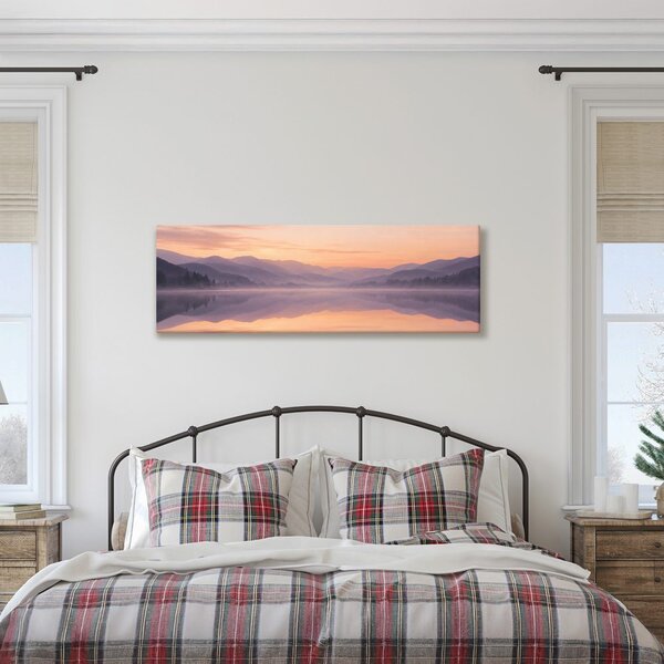 Quadro su tela – Alba tranquilla sull’acqua