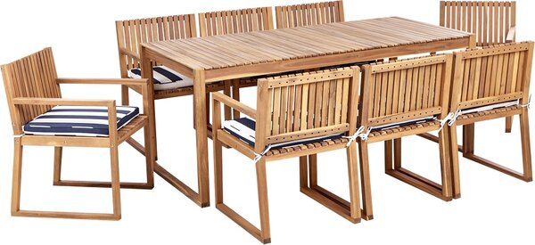 BELIANI Set da pranzo da giardino in legno di acacia chiaro tavolo 8 sedie con cuscini blu scuro e bianchi stile rustico da esterno