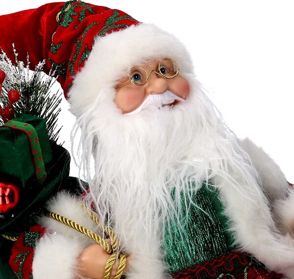Babbo natale in tessuto bordeaux seduto con musica e movimento cm xh35,5