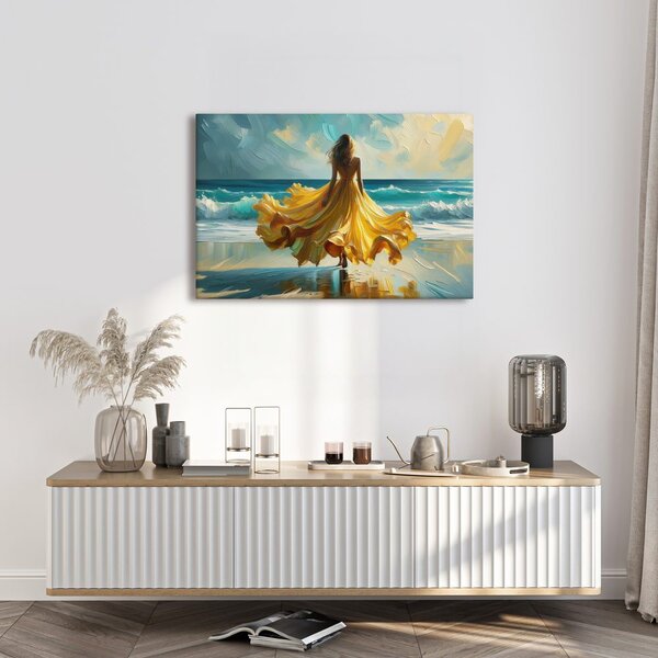 Quadro su tela – Donna in abito giallo sulla spiaggia