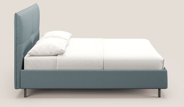 Izumi letto imbottito contenitore con piedi alti in tessuto smacchiabi