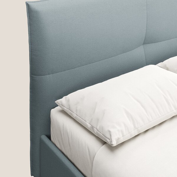 Izumi letto imbottito contenitore con piedi alti in tessuto smacchiabi