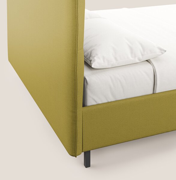 Izumi letto imbottito contenitore con piedi alti in tessuto smacchiabi