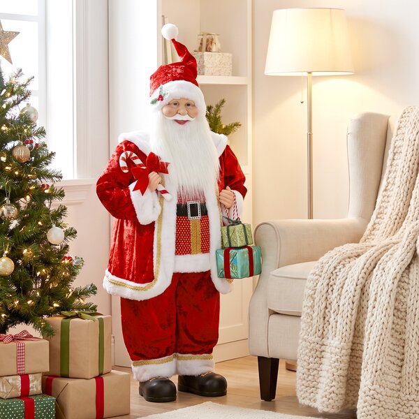 Babbo Natale Animato a Batteria 48x22x120 cm con Musica e Movimento Regali e Bastoncino di Zucchero in Velluto
