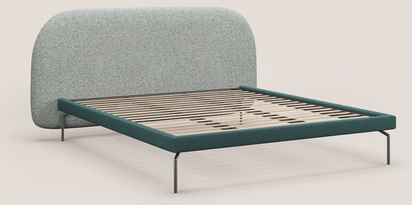 Soleil letto imbottito di design con piedi alti in metallo in bouclet