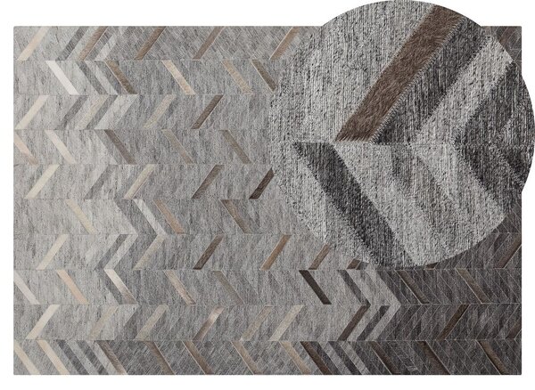 Tappeto 140 x 200 cm in pelle di vacchetta grigia motivo geometrico color grigio Beliani