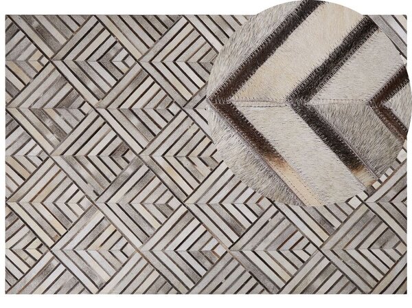 Tappeto in pelle di vacchetta Patchwork in pelle beige Motivo geometrico a rombi 160 x 230 cm Beliani