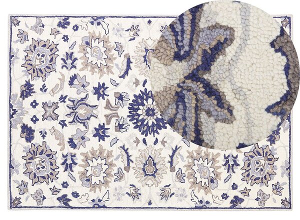 Tappeto in lana beige e blu 140 x 200 cm a pelo fitto con motivo orientale Beliani