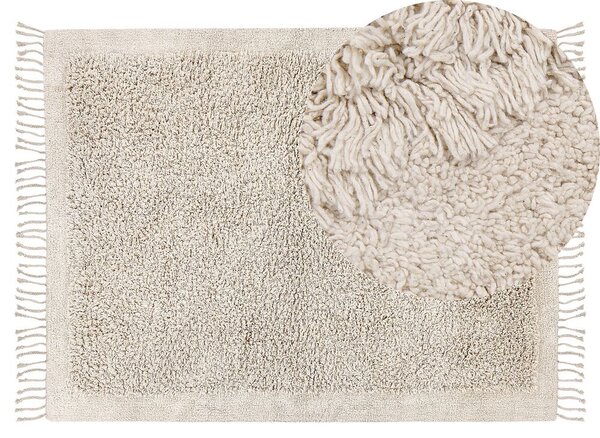Tappeto rettangolare in cotone beige 140 x 200 cm con frange boho soggiorno camera da letto Beliani