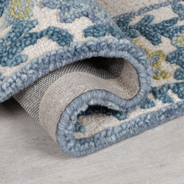 Tappeto blu/avorio in misto lana tessuto a mano 160x230 cm Myla Floral Frame – Flair Rugs